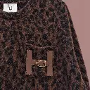Camisola felpuda leopardo com tiras de couro.webp